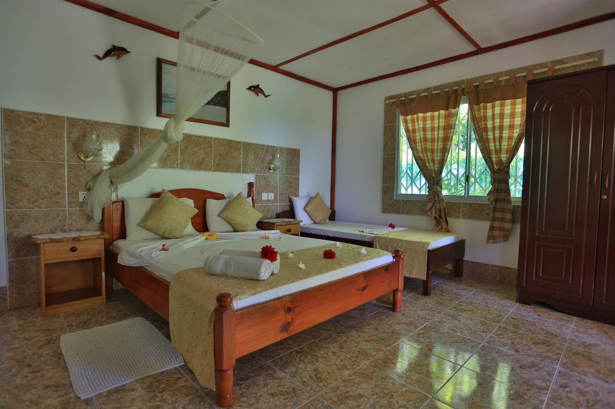 Rising Sun Guesthouse La Digue Quarto foto